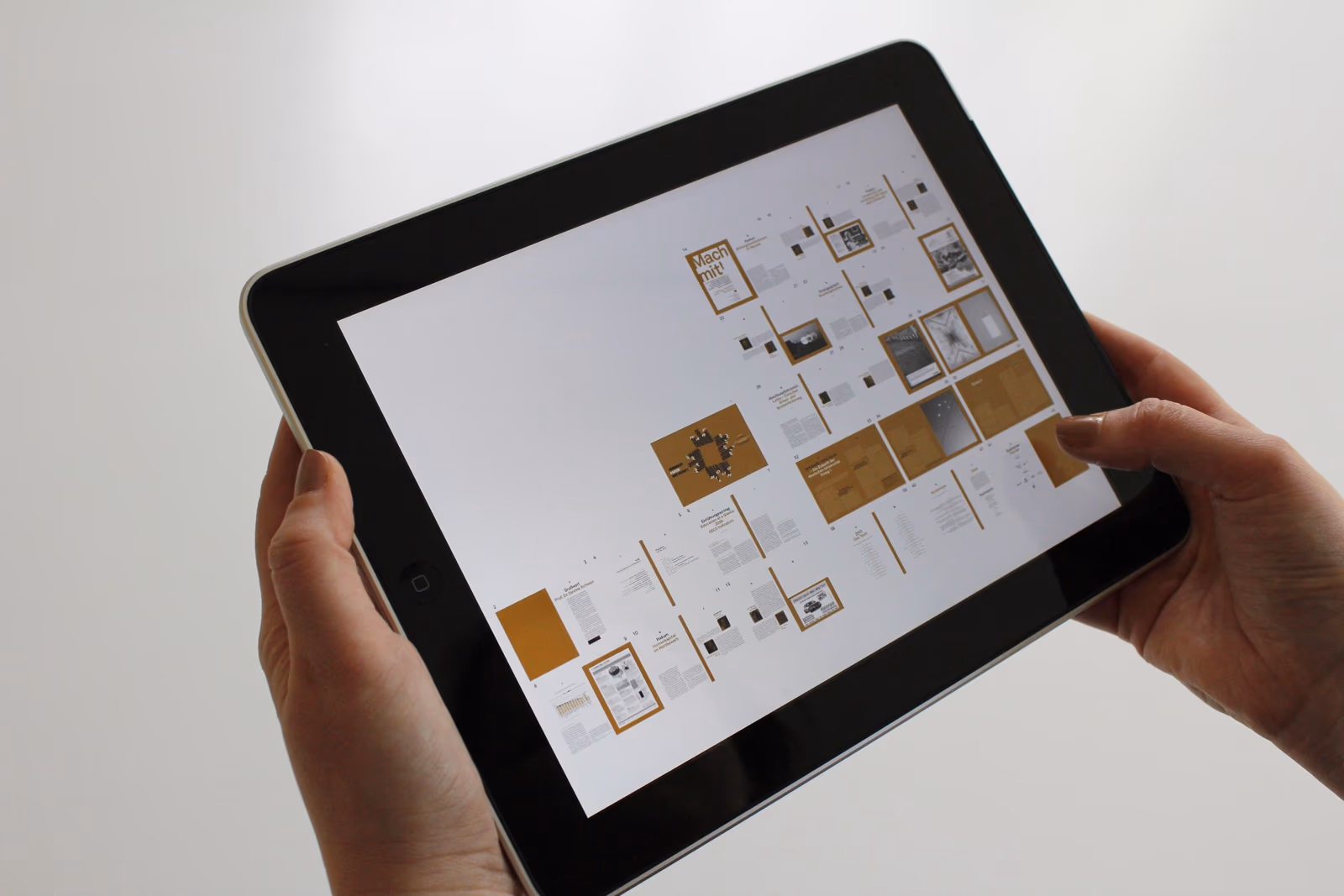 A person holding a tablet